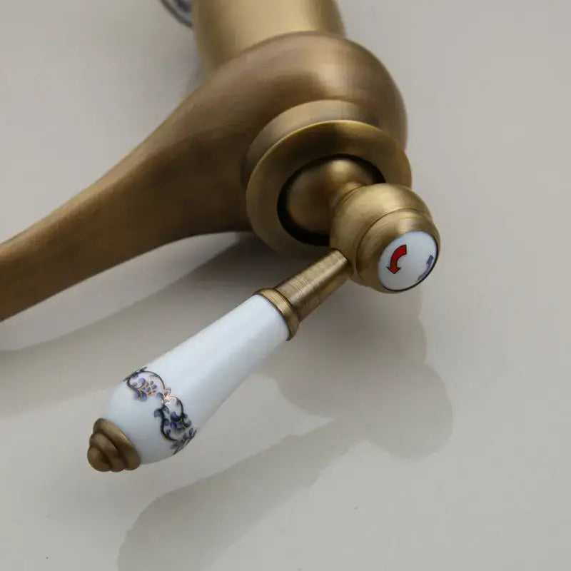 DecorBites™ Antique Brass Bathroom Basin Faucet Deck Mounted Retro Mixer Vanity Taps