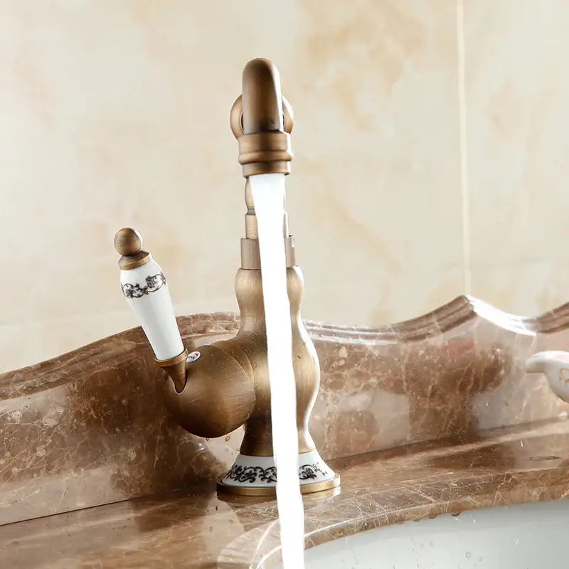 DecorBites™ Antique Brass Bathroom Sink Faucet Single Handle Swivel Spout Hot Cold Mixer