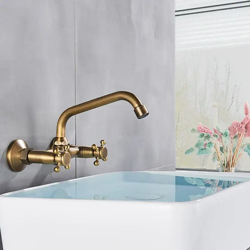 DecorBites™ Antique Brass Kitchen Faucet with Swivel Spout and Dual Handle Mixer