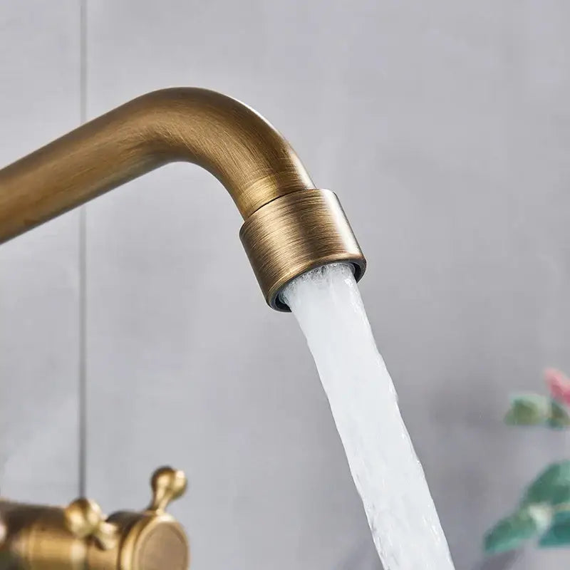 DecorBites™ Antique Brass Kitchen Faucet with Swivel Spout and Dual Handle Mixer