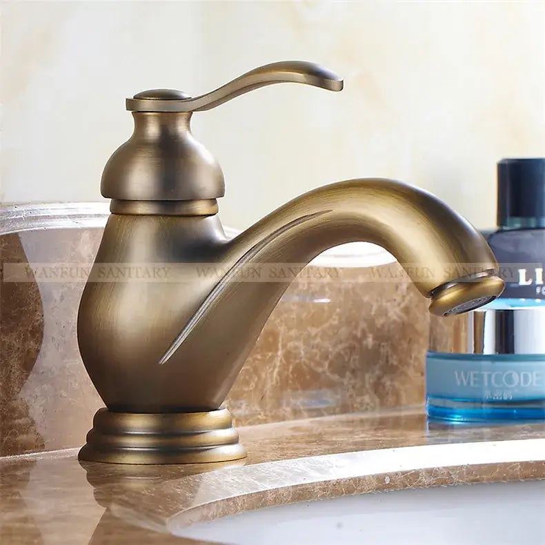DecorBites™ Antique Brass Single Handle Deck Mount Bathroom Sink Faucet.