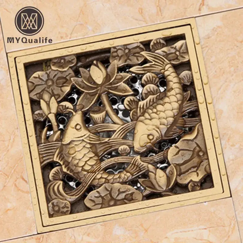 DecorBites™ مصفاة شعر لمصرف أرضية الحمام المربعة بنقش سمكة من النحاس العتيق