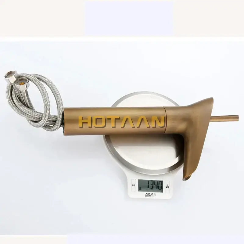 DecorBites™ Antique Brass Waterfall Basin Faucet Mixer Tap for Bathroom Sink