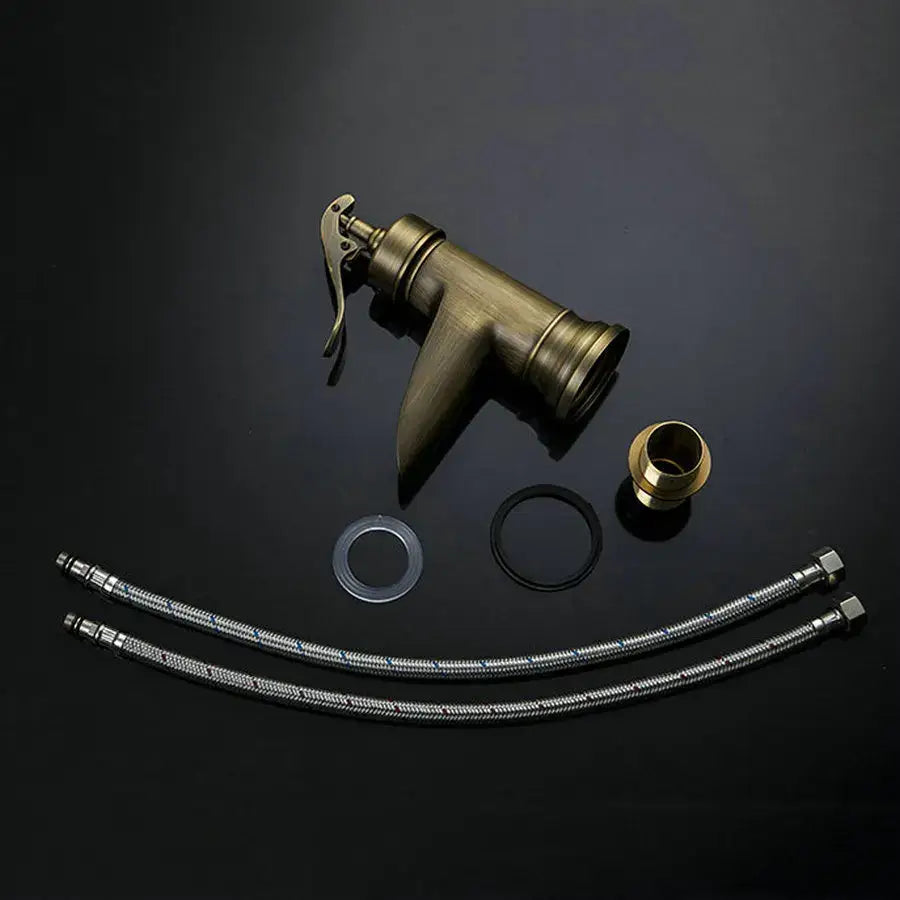 DecorBites™ Antique Brass Waterfall Basin Faucet with Art Design Handle