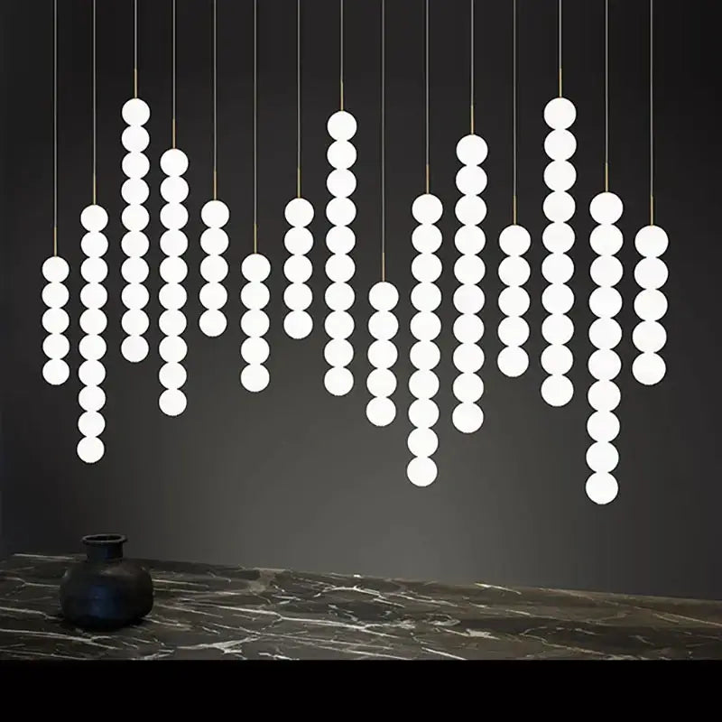 DecorBites™ Art Deco LED Glass Pingpong Pendant Light in Gold Chrome Black.