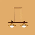 Rustic wooden bamboo pendant lighting with white glass shades and bird figurines in art deco style