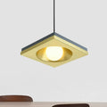 DecorBites™ pendant light with brushed brass square frame, matte black accents, and warm bulb base for bedrooms