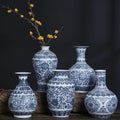 Decorbites™ blue and white ceramic vase with intricate floral patterns for elegant home decor and white ceramic vase options