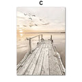 Decorbites™ bohemia beach landscape canvas wall art featuring a weathered wooden dock under a soft sunset sky
