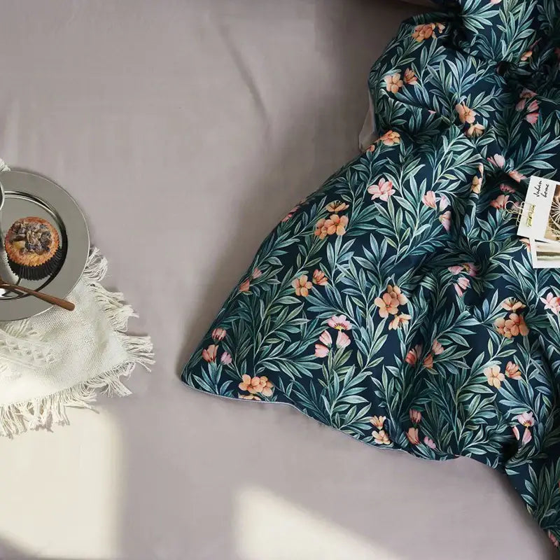 DecorBites bright flamingo quilted duvet cover in dark teal with botanical print made from luxury egyptian cotton