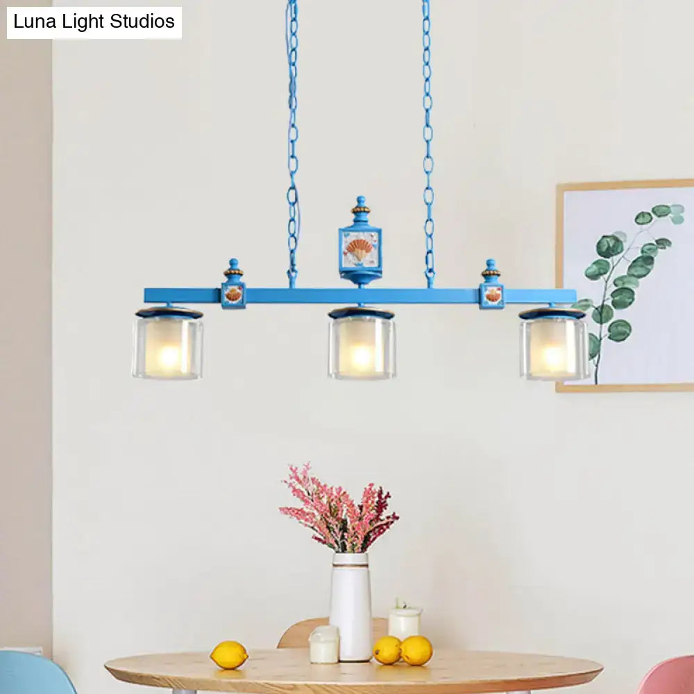Blue metal DecorBites™ chandelier with three sky water blue glass shades and decorative shell motifs