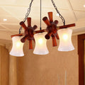 DecorBites classic pendant light kit with warm wood rudder design and three cream crackle glass shades for dining room