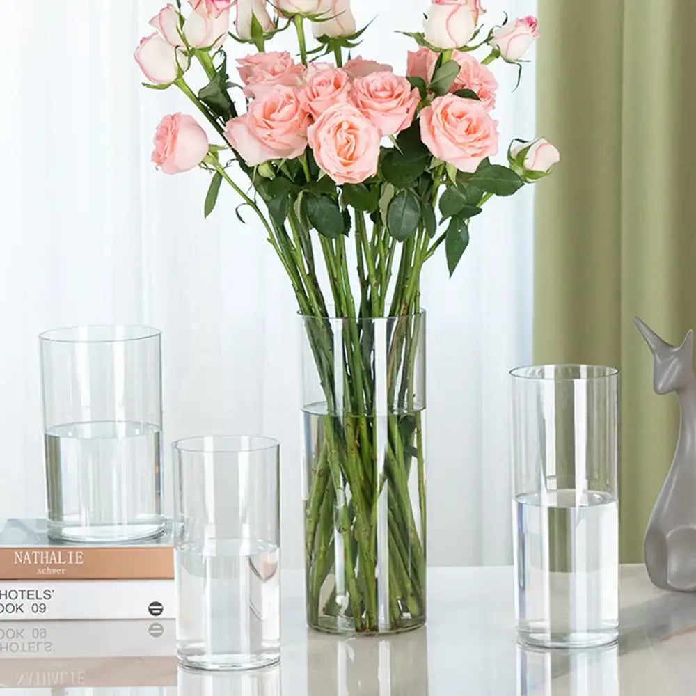 Decorbites clear acrylic cylinder vase holding pink roses for weddings tall clear acrylic cylinder design