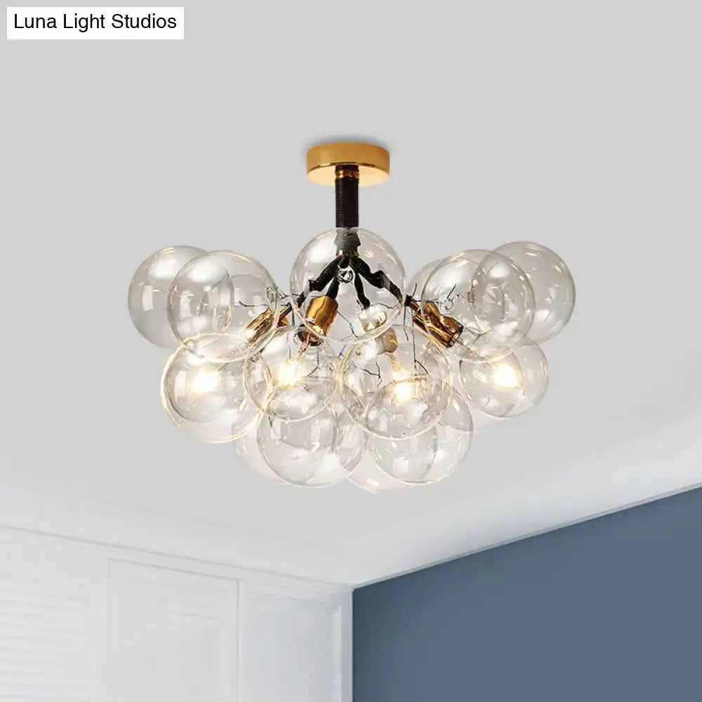 DecorBites clear glass semi flush ceiling light with brass finish and black arms for foyer and corridor illumination