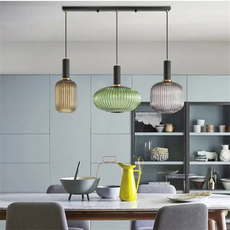 DecorBites™ pendant lights with colorful ribbed glass shades in amber green and grayish-blue for retro style