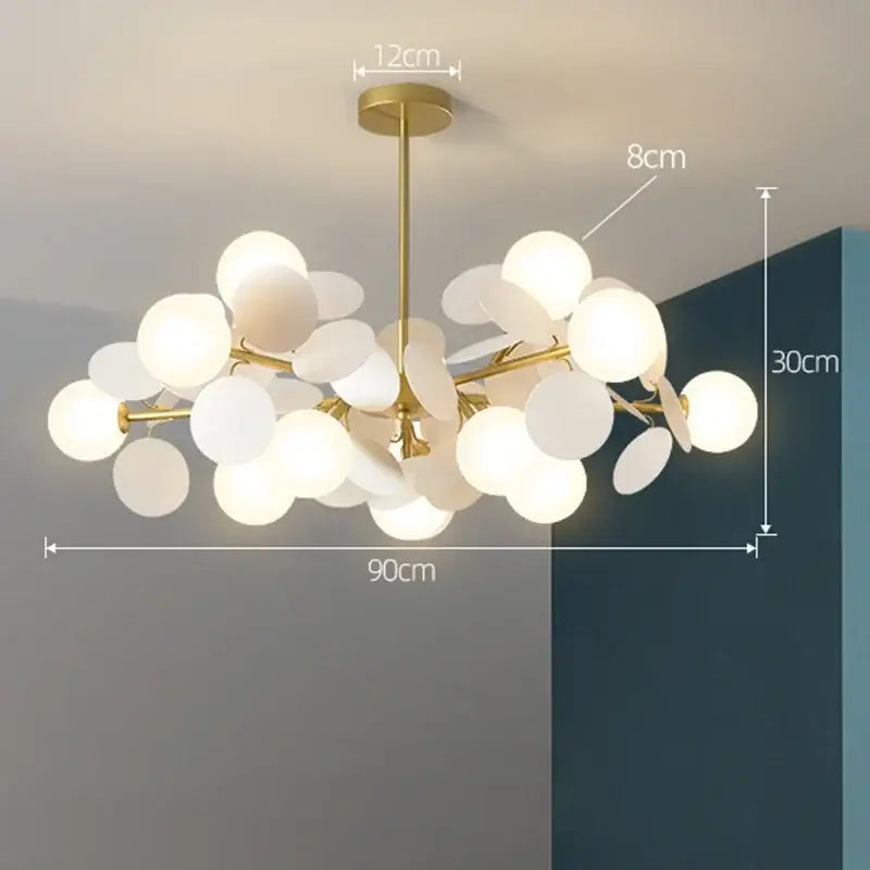 Gold-toned colorful led branch chandelier with frosted glass globe shades for living room and bedroom decor