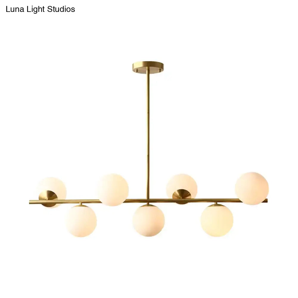 DecorBites™ Contemporary Brass Pendant Lamp with 7-Light White Glass, Ideal for Living Room Illumination