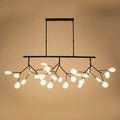 Black metal DecorBites™ heracleum island pendant light with branching arms and glowing spherical bulbs for dining rooms