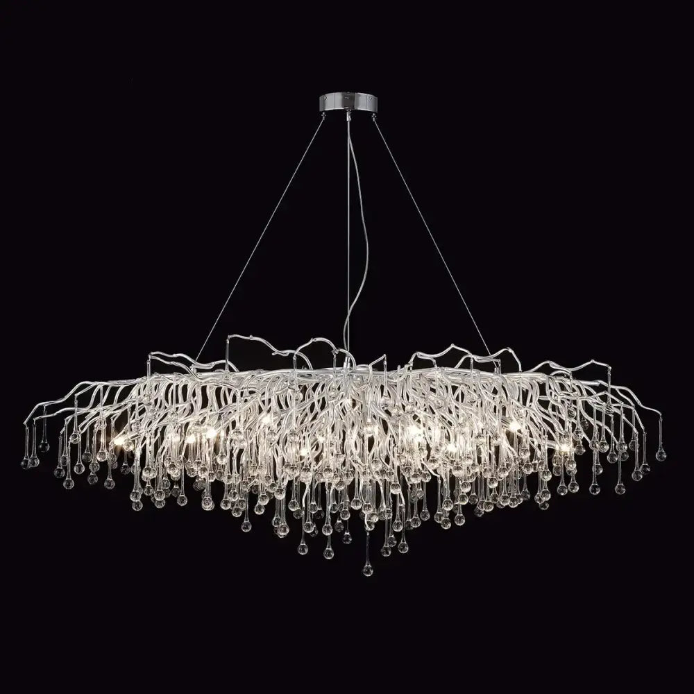 A modern silver crystal chandelier by DecorBites with raindrop crystals and an organic branching light fixture design