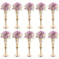 Gold-colored metallic DecorBites™ crystal flower stand set with crystal accents and purple floral arrangements