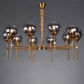 Brass-finished decorbites™ designer metal chandelier with multiple smoky glass globes and twisted rope pendant for modern living