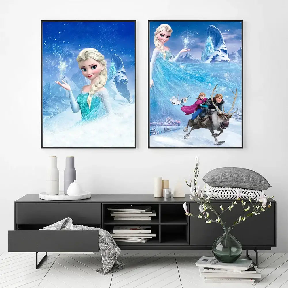 Two framed disney frozen elsa canvas prints featuring elsa in a shimmering blue gown with frozen characters on ice
