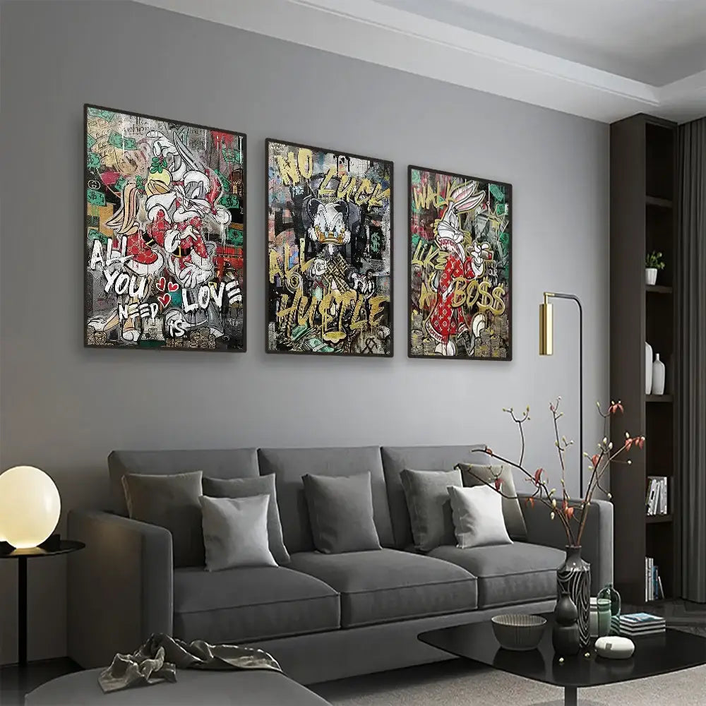 Three framed disney marvel donald duck canvas wall art with vibrant graffiti style cartoon characters and bold text