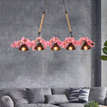 Rustic industrial factory conical island pendant light with five dark brown metal shades and pink cherry blossoms
