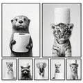 Black and white framed wall art featuring funny animals like otter tiger cub and kitten with toilet paper for bathroom home