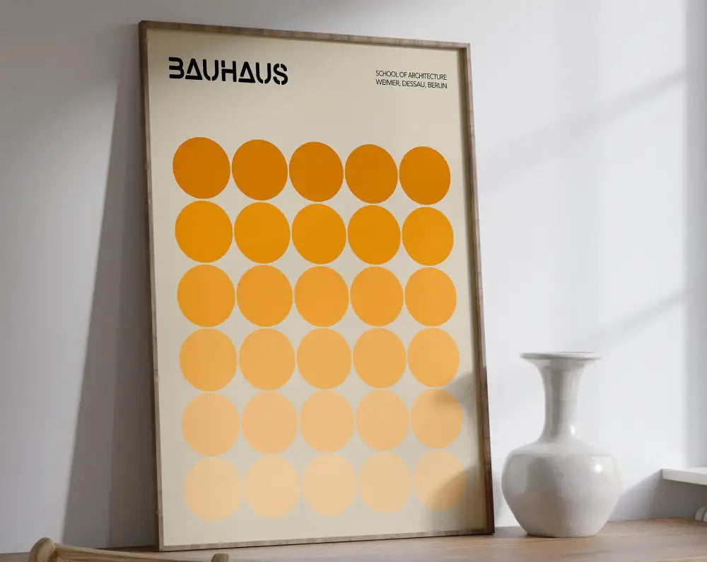 Decorbites™ geometric bauhaus canvas poster with bold black text and orange circles on off-white canvas framed in light wood
