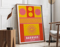 Vibrant bauhaus-themed decorbites™ geometric canvas poster with pink and yellow circles in wooden frame wall art
