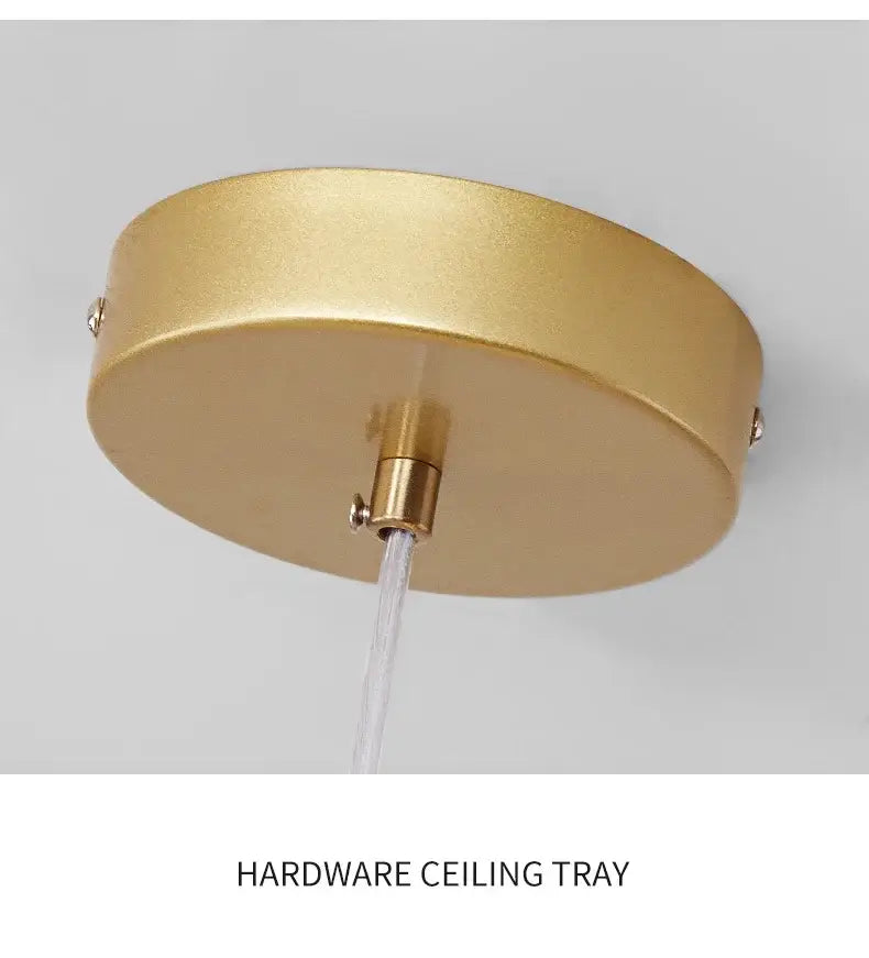 Gold-colored circular ceiling tray with brushed metallic finish and central mounting hardware for decorbites glass ball chandelier