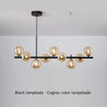 Black metal DecorBites™ ball ceiling chandelier with multiple amber-tinted glass globe shades for home lighting