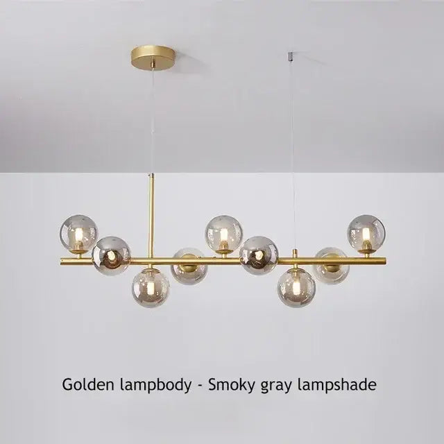 Golden decorbites glass ball ceiling chandelier with smoky gray glass globes and polished brass frame for home lighting