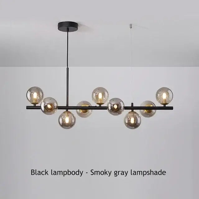 Black metal glass ball chandelier with multiple smoky gray glass globe shades for dining room by decorbites