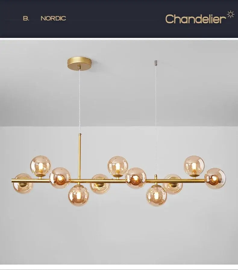 DecorBites™ glass ball chandelier gold-toned with amber glass globe bulbs on sleek horizontal bar for modern lighting