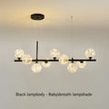 Decorbites™ glass ball chandelier is a black metal lighting fixture with frosted spherical glass ball shades resembling baby’s breath