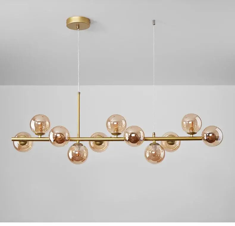Gold-toned decorbites™ glass ball chandelier with amber glass globe bulbs lighting fixture for modern ceilings