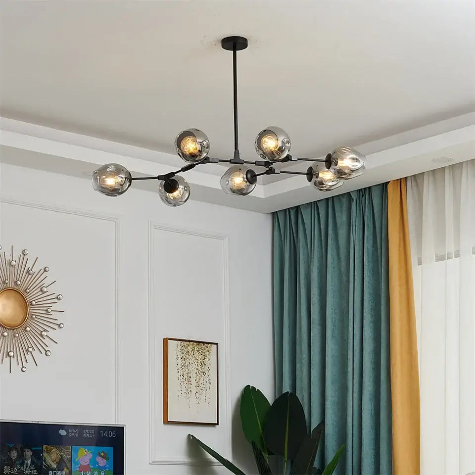 Modern black metal DecorBites™ glass ball LED chandelier with multiple spherical glass globe lights in Nordic style