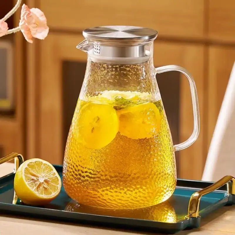 Hammered glass tea set with silver lid jug and cups for dining room