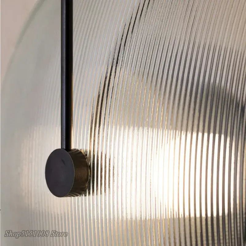 Minimalist black ribbed glass wall lamp for bedroom lighting