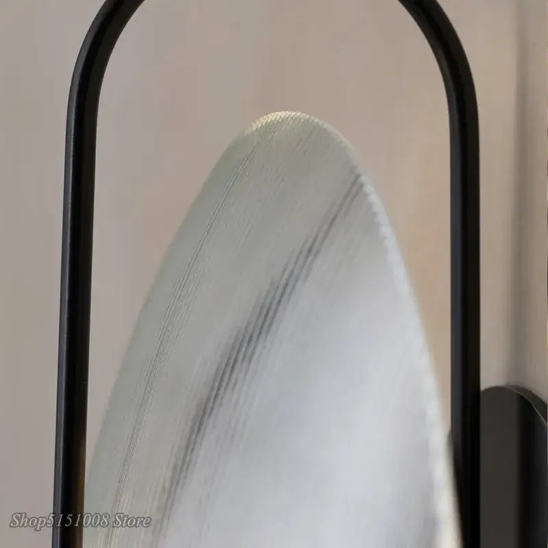 Minimalist black ribbed glass wall lamp for bedroom lighting
