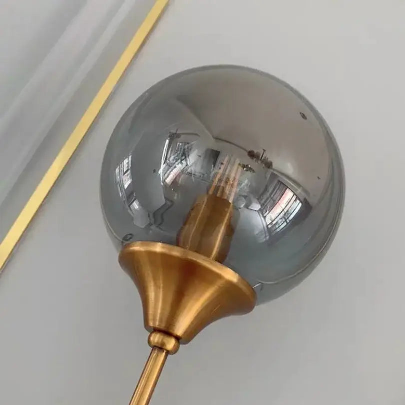 Modern brass and smoked glass wall lamp bedroom sconce