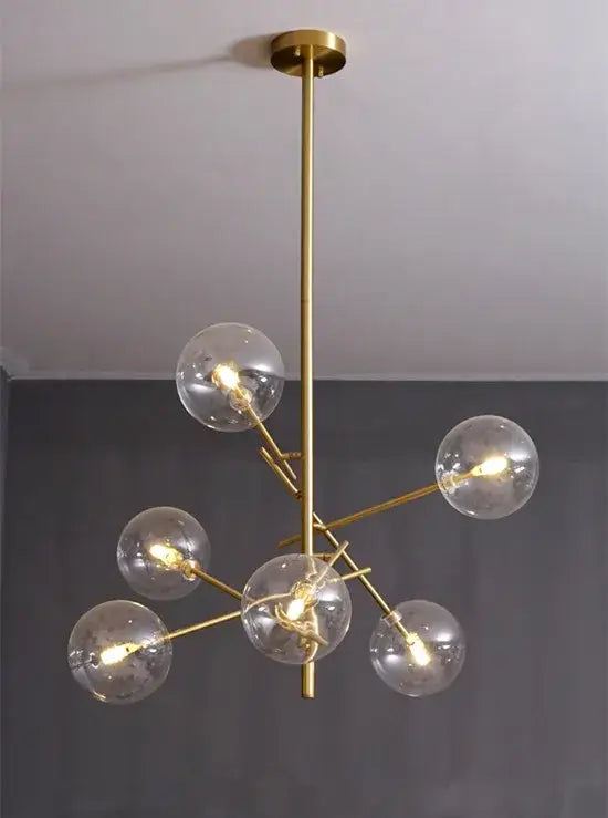 Decorbites gold glass bubble chandelier with gold-toned frame and clear glass spheres for dining room lighting