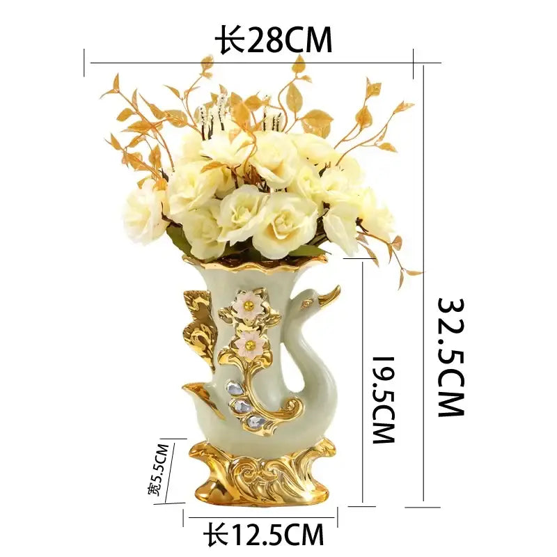 Elegant light green ceramic swan vase with gold accents and floral detailing in DecorBites gold glass vase collection