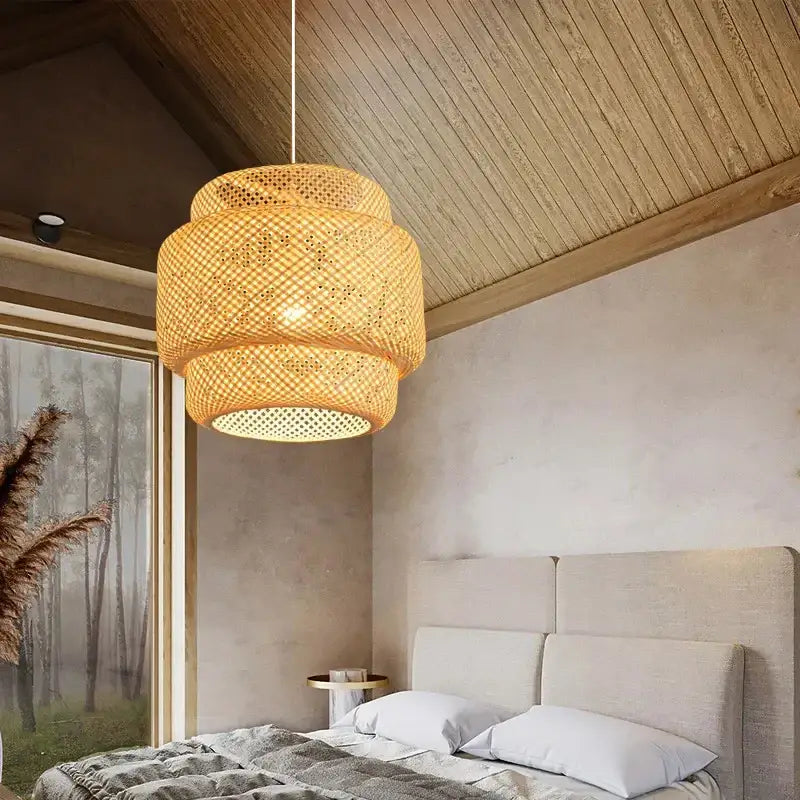 A warm tiered pendant lamp in chinese style hand knitted from natural woven rattan with a delicate lattice pattern