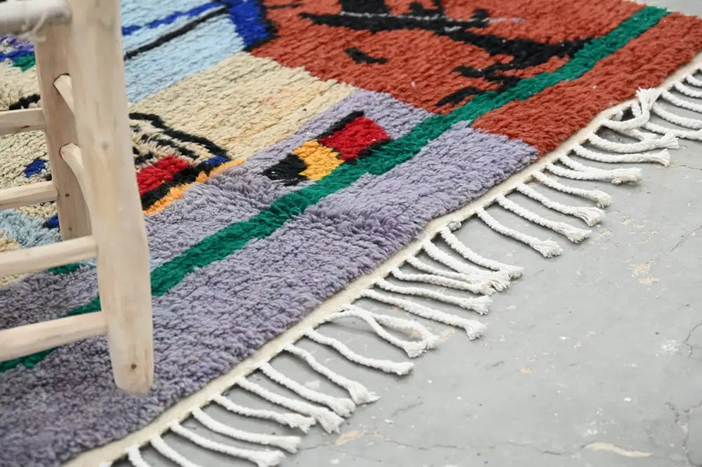Decorbites™ handmade moroccan azilal rug 244x147 cm with colorful geometric pattern and white fringe edges