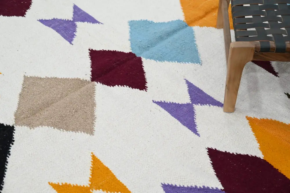 Colorful geometric decorbites™ handmade moroccan azilal rug 305x204cm with bold hand-knotted patterns on white base