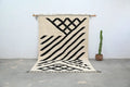 Beige and black geometric patterned wool handmade moroccan azilal rug with fringe 317x200 cm decorbites