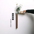DecorBites handmade nordic solid wood wall vase in dark wood with minimalist design and smooth finish for plants